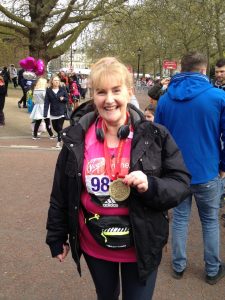 Jill with marathon medal